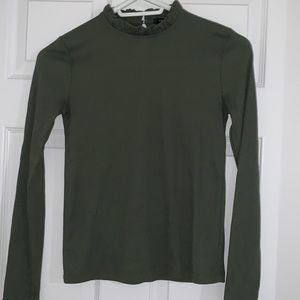 Ruffled green mock turtle neck